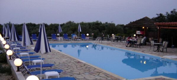 Outdoor pool, pool umbrellas, pool loungers
