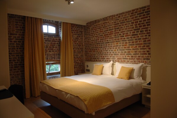 Standard Room | Premium bedding, desk, blackout curtains, soundproofing
