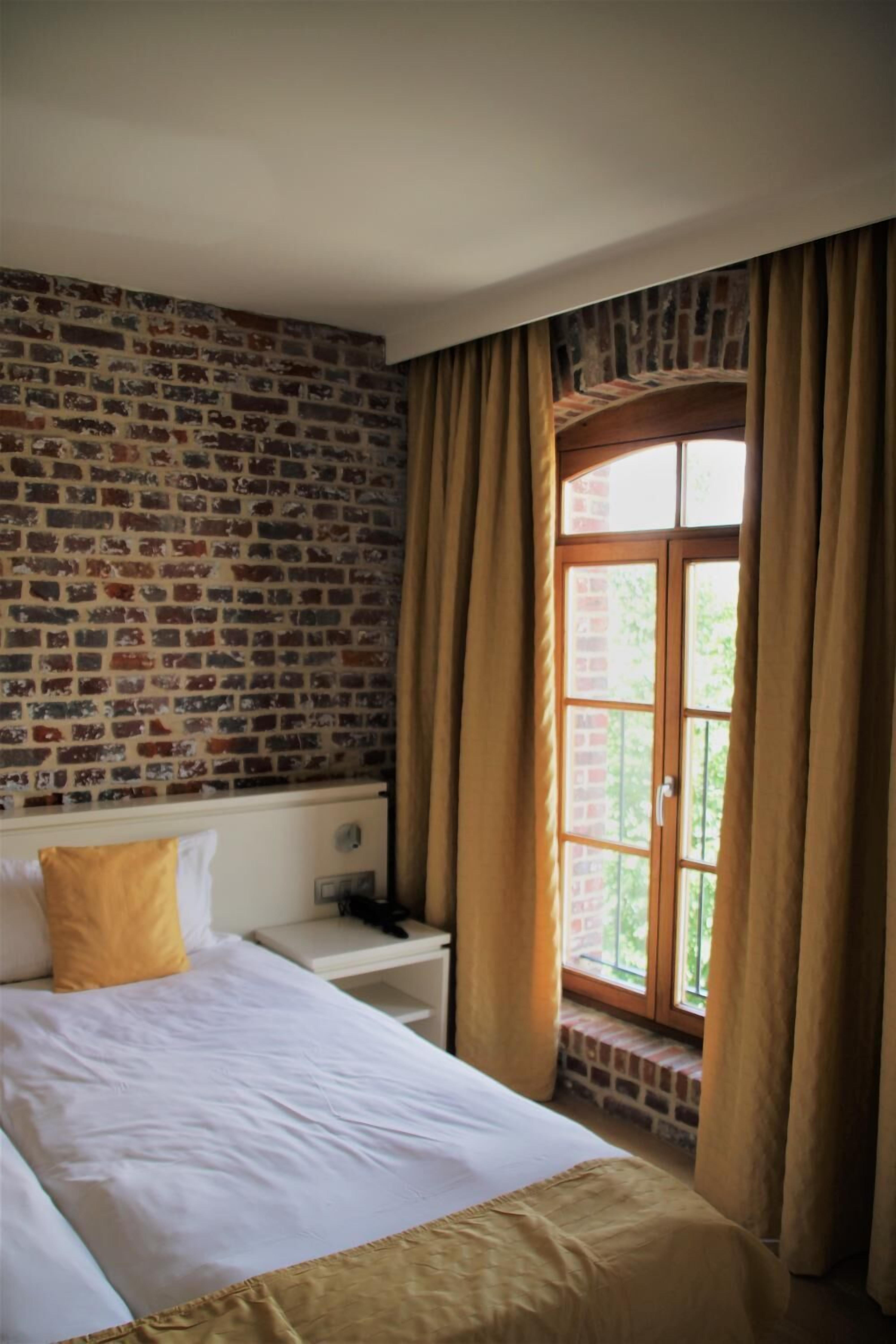 premium bedding, desk, blackout curtains, soundproofing