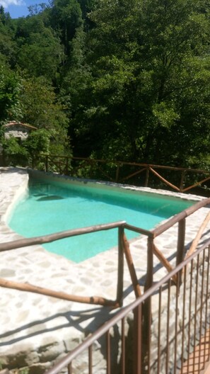 Outdoor pool, open 10:00 AM to 7:30 PM, pool umbrellas, pool loungers