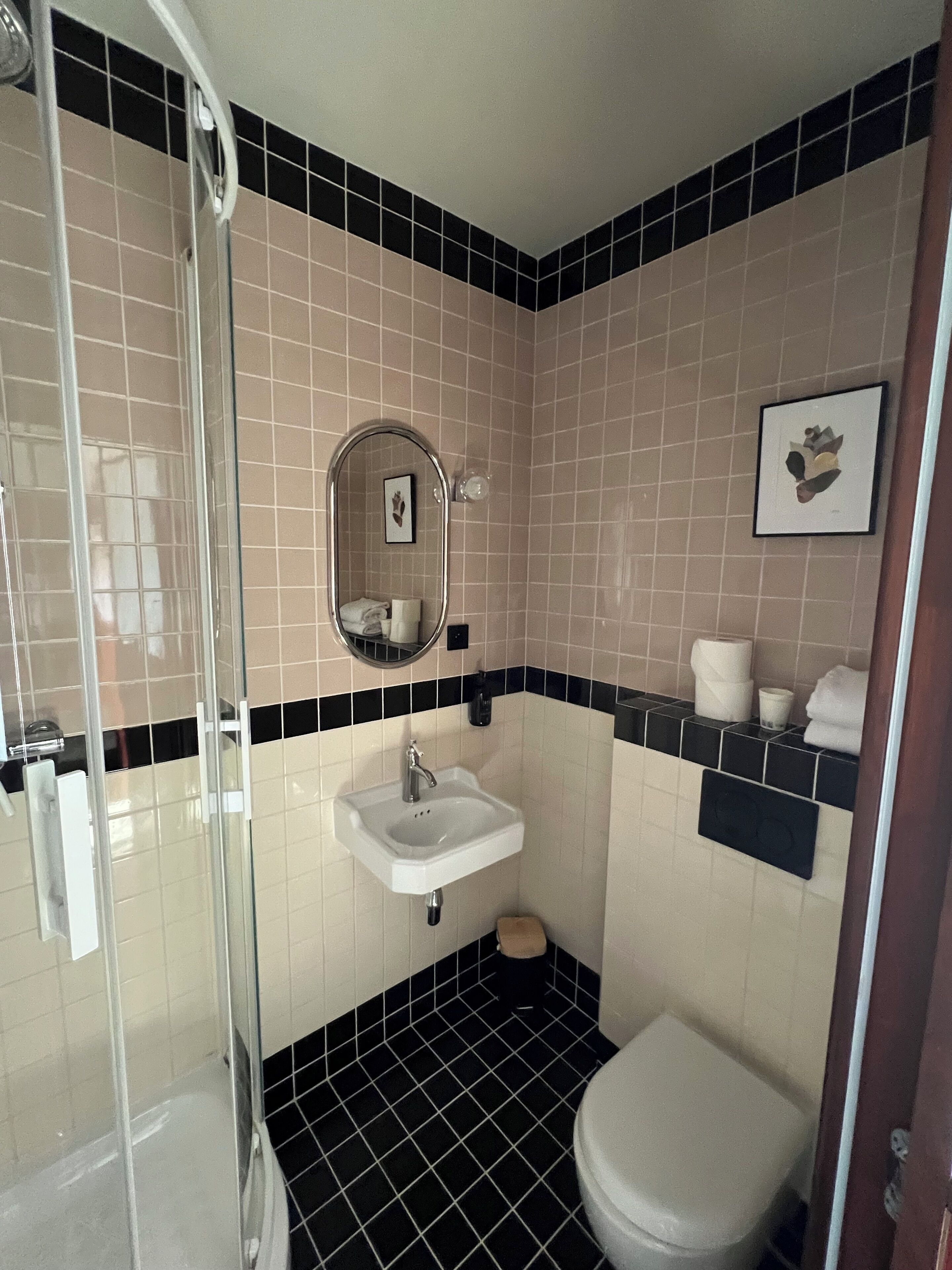 standard double room | bathroom | shower, rainfall showerhead, hair dryer, towels