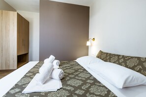 Luxury Suite, Sea View | Premium bedding, pillowtop beds, blackout drapes, soundproofing - Gregory Comfort Hotel (Chania)