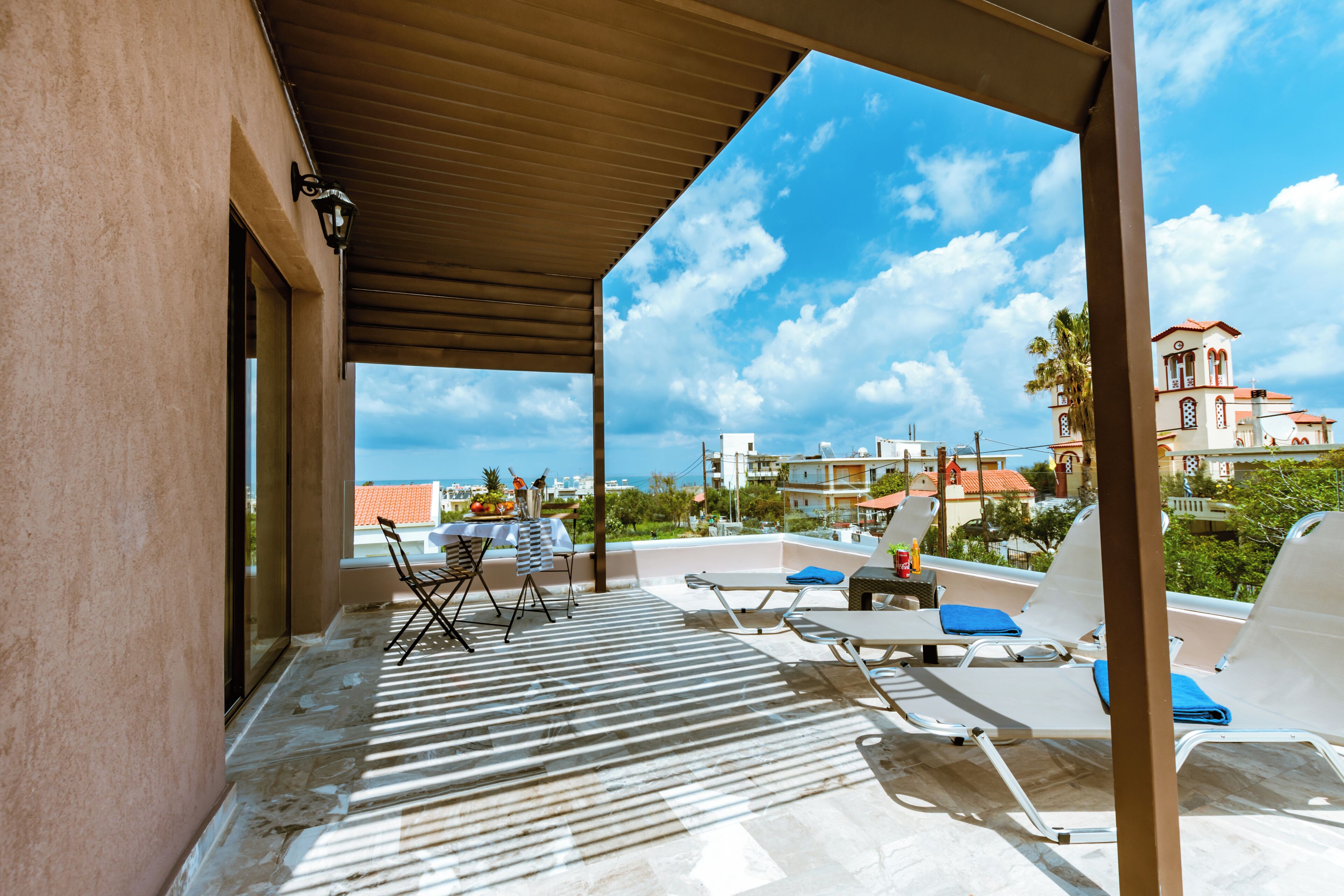 Habitación triple ejecutiva | Terraza o patio