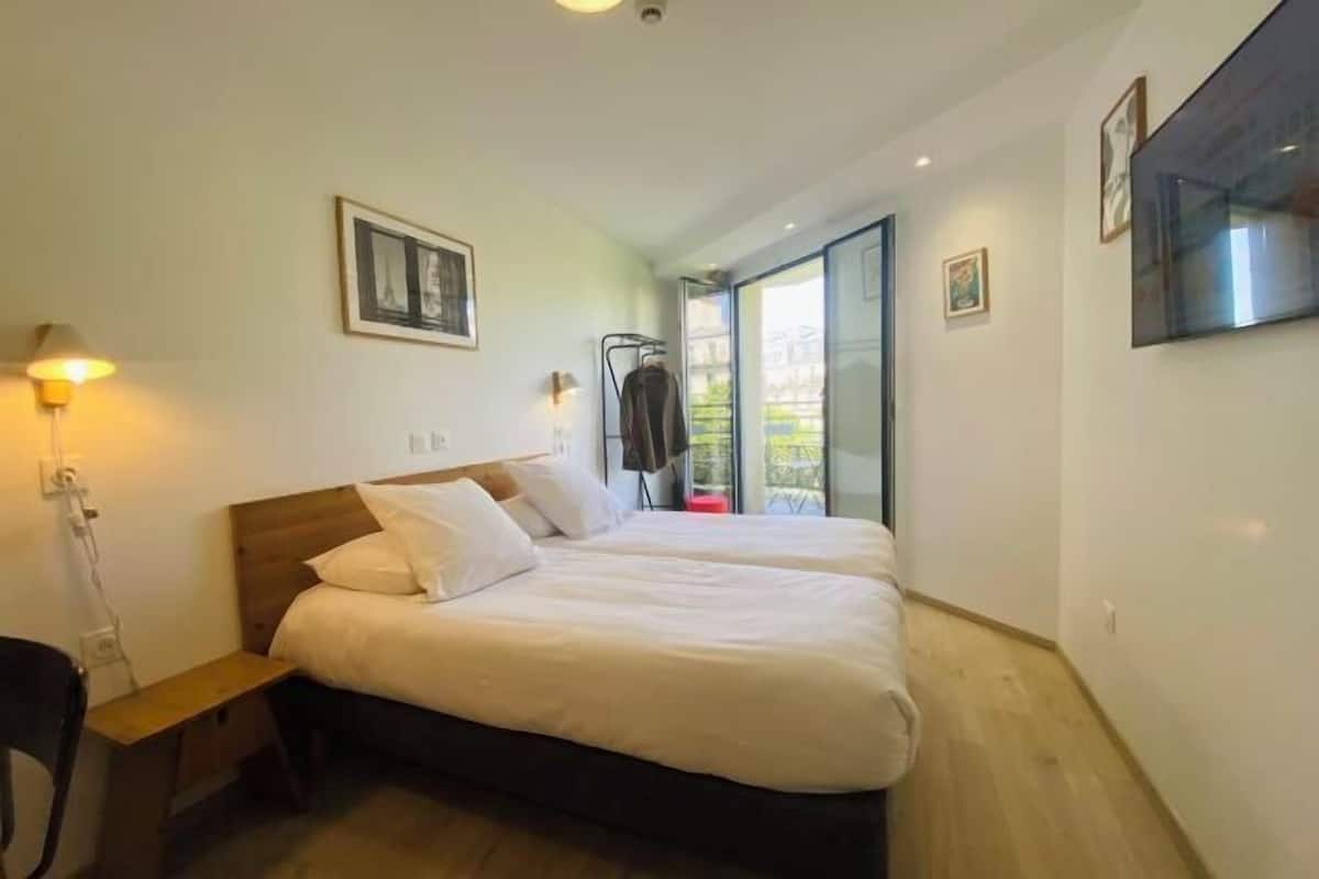 1 habitación, cortinas blackout, wifi gratis y ropa de cama