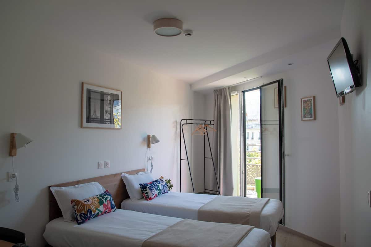 Twin kamer | 1 slaapkamer, verduisterende gordijnen, gratis wifi, beddengoed
