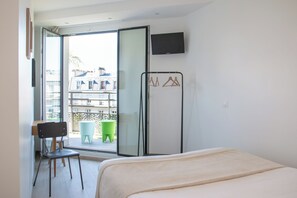 Verduisterende gordijnen, gratis wifi, beddengoed