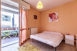 Apartment, 1 Bedroom | 1 bedroom, free rollaway beds, bed sheets - Appartamento Dossetti 7 (Bologna)