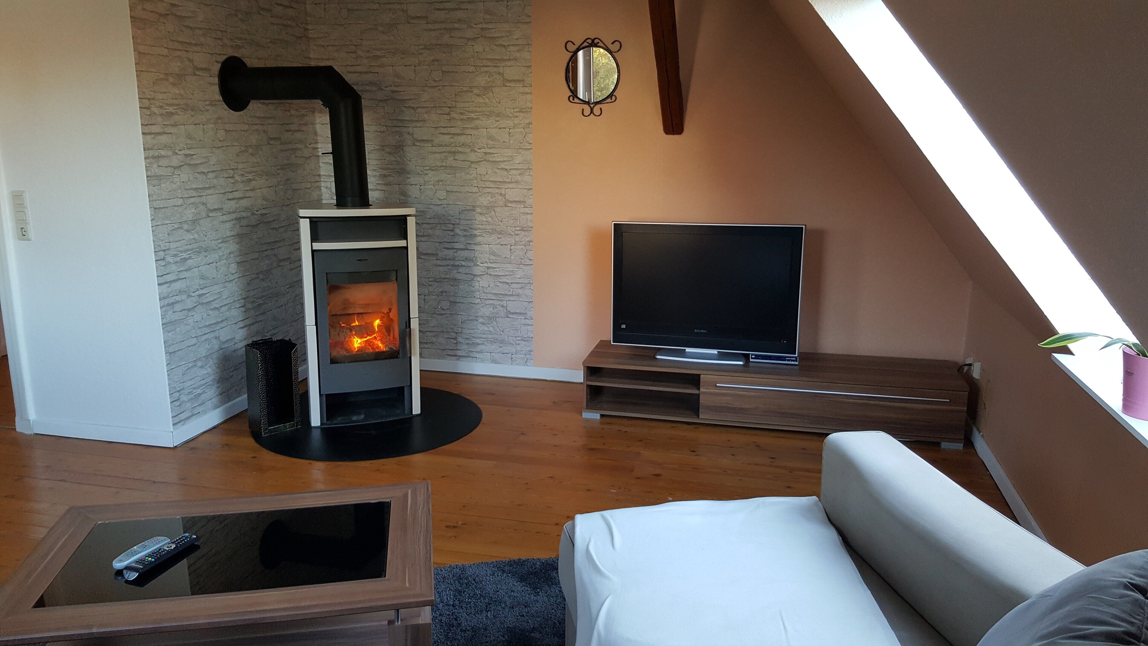 Wohnzimmer mit Kamin
