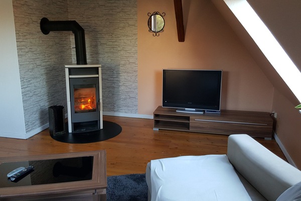 Wohnzimmer mit Kamin