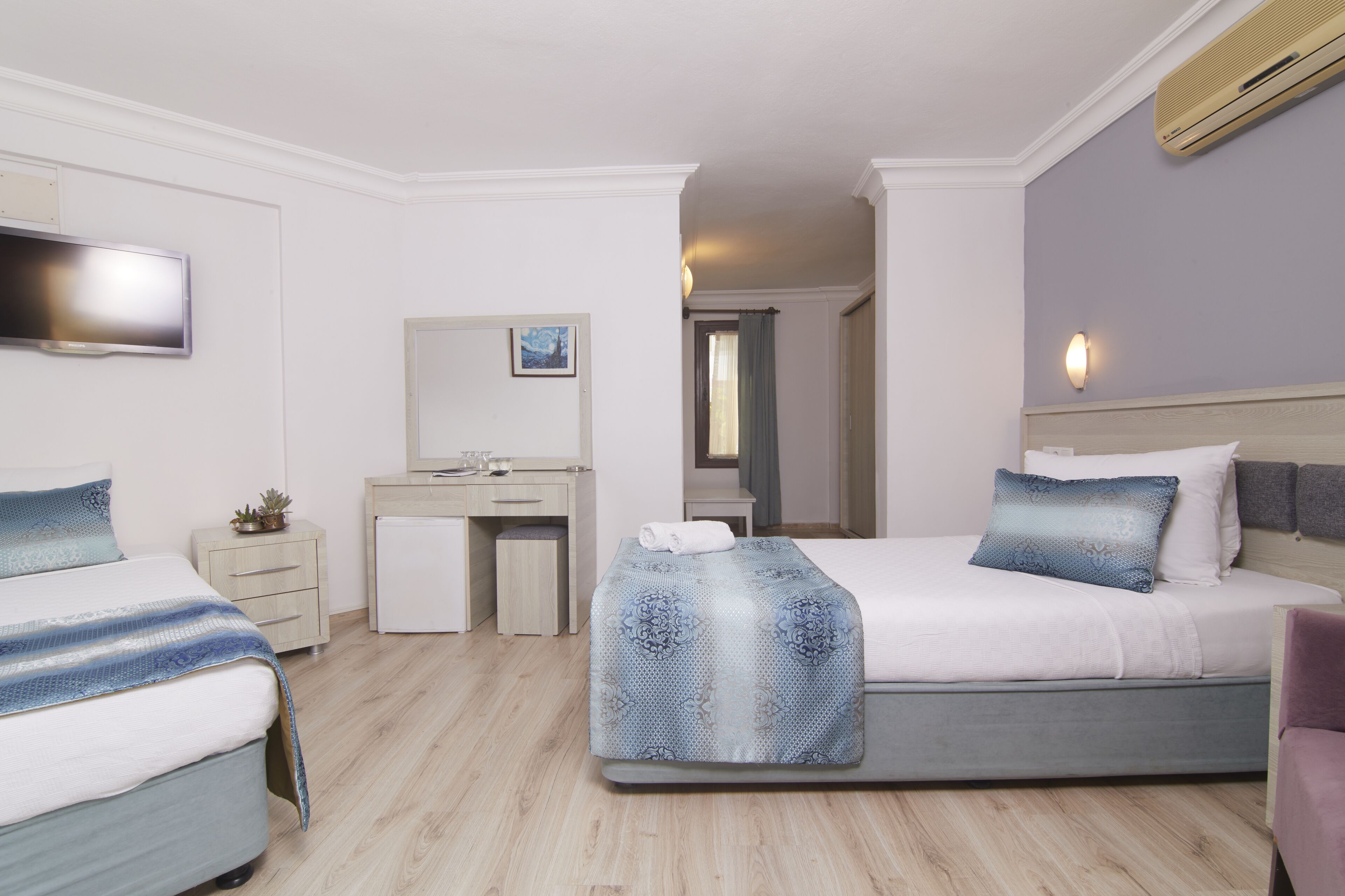 standard triple room | premium bedding, minibar, desk, blackout curtains