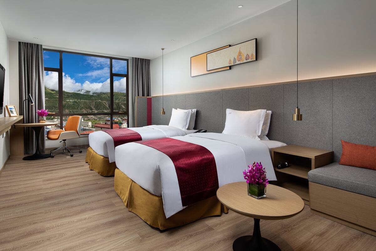 1 Schlafzimmer, hochwertige Bettwaren, Daunenbettdecken, Minibar