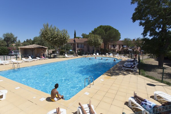 Seasonal outdoor pool, pool umbrellas
