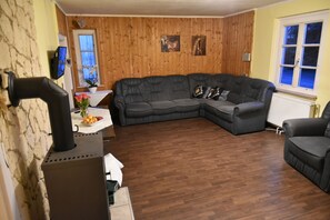 Apartamento | Zona de estar | Una televisión de pantalla plana