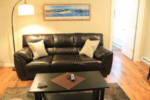 Deluxe Apartment, 1 King Bed with Sofa bed | Living area | Flat-screen TV - Strictly Moose Luxury Vacation Suites (Gorham)