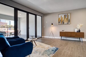 Exclusive Two-Bedroom Apartment with Balcony | Living area | 43-inch TV with digital channels, streaming services