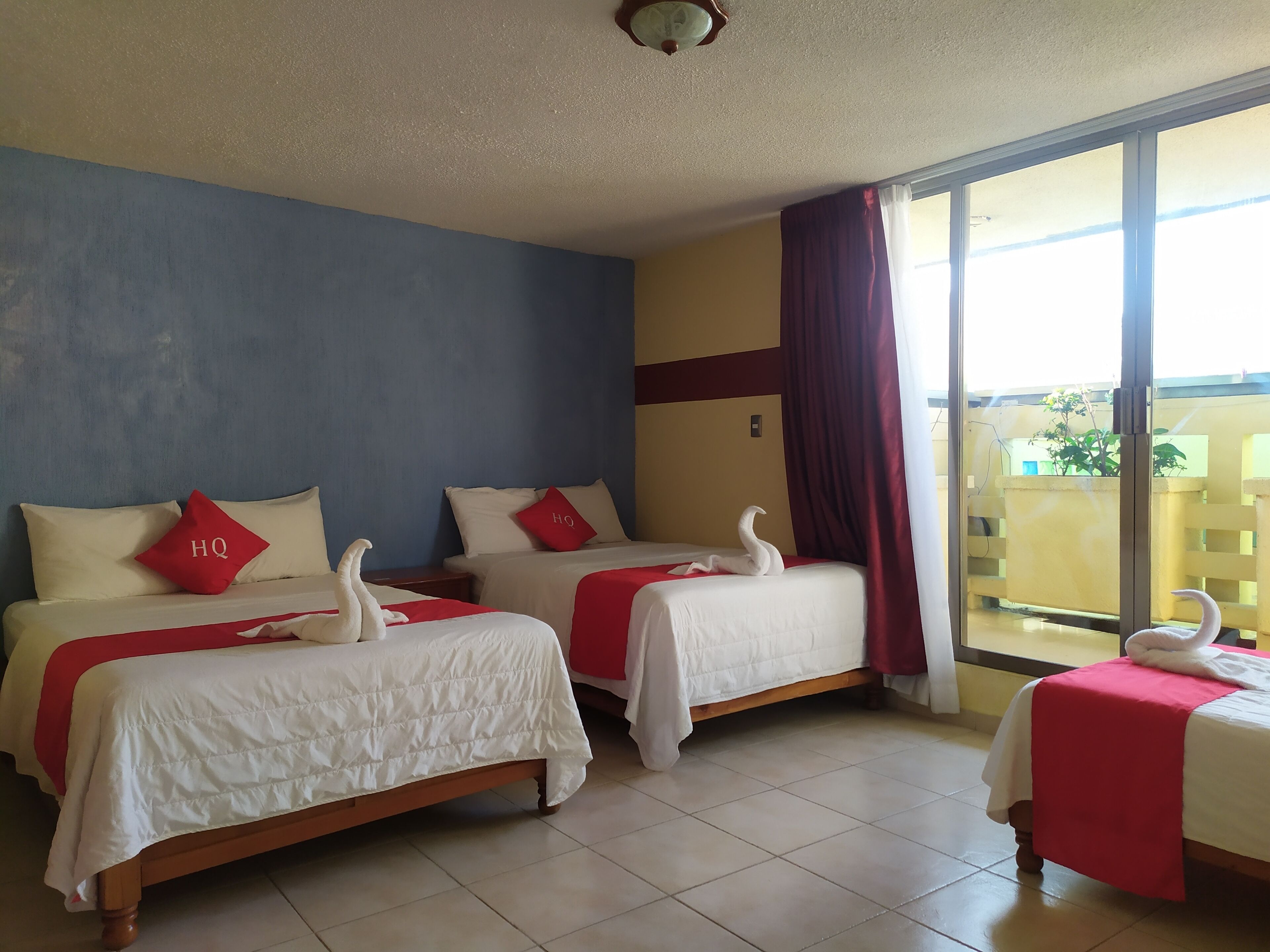 standard room, multiple beds | 1 bedroom, down duvets, individually decorated, individually furnished
