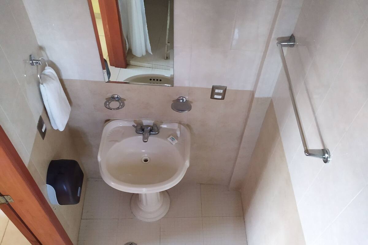 standard room | bathroom | shower, rainfall showerhead, towels, soap