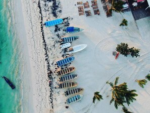 Beach nearby, white sand, 3 beach bars