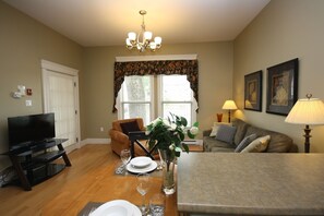 Furnished Apartment (102) | Living area | Flat-screen TV, DVD player