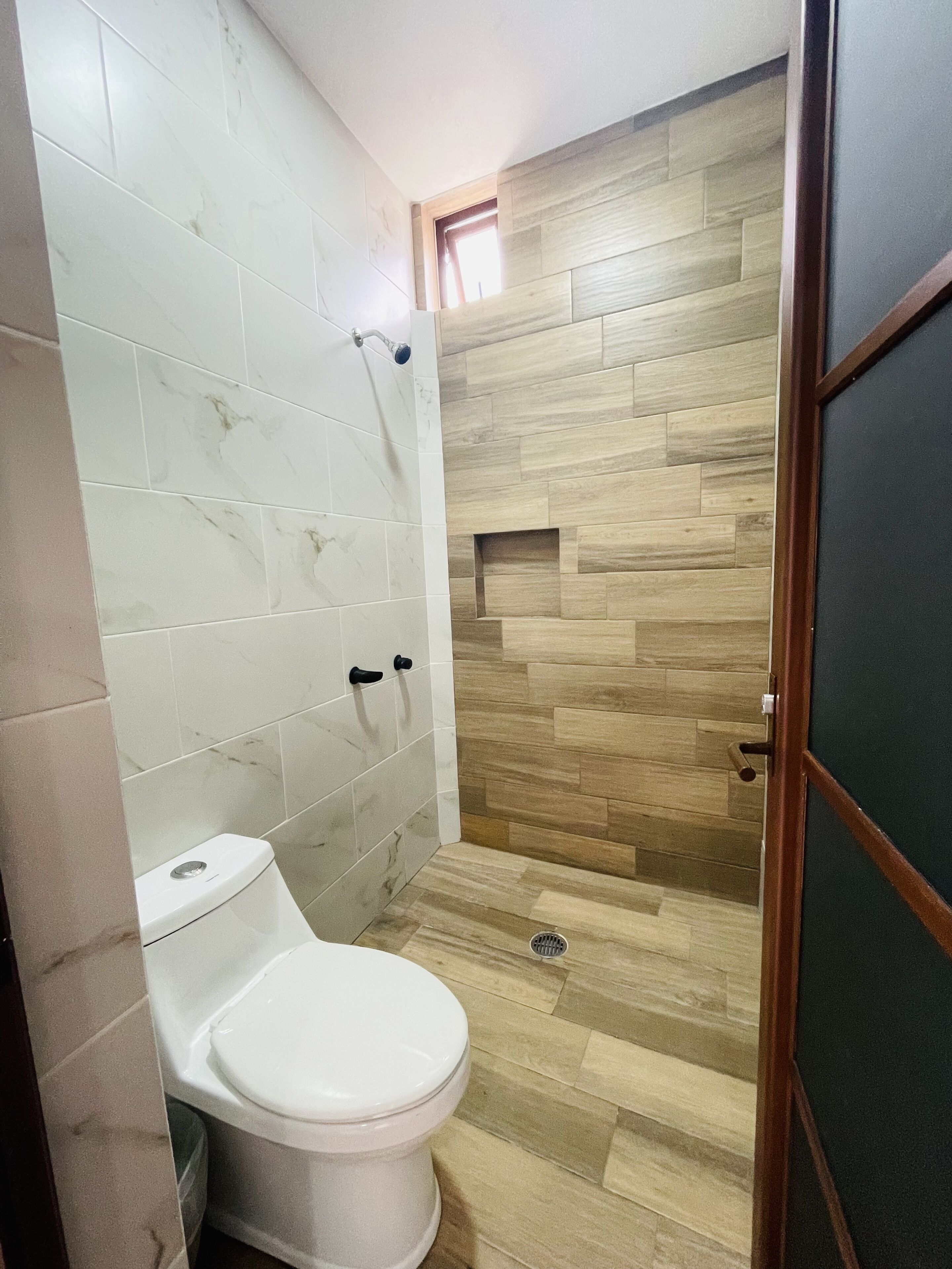 family room, 2 bedrooms, non smoking, private bathroom | bathroom | shower, towels, soap, shampoo