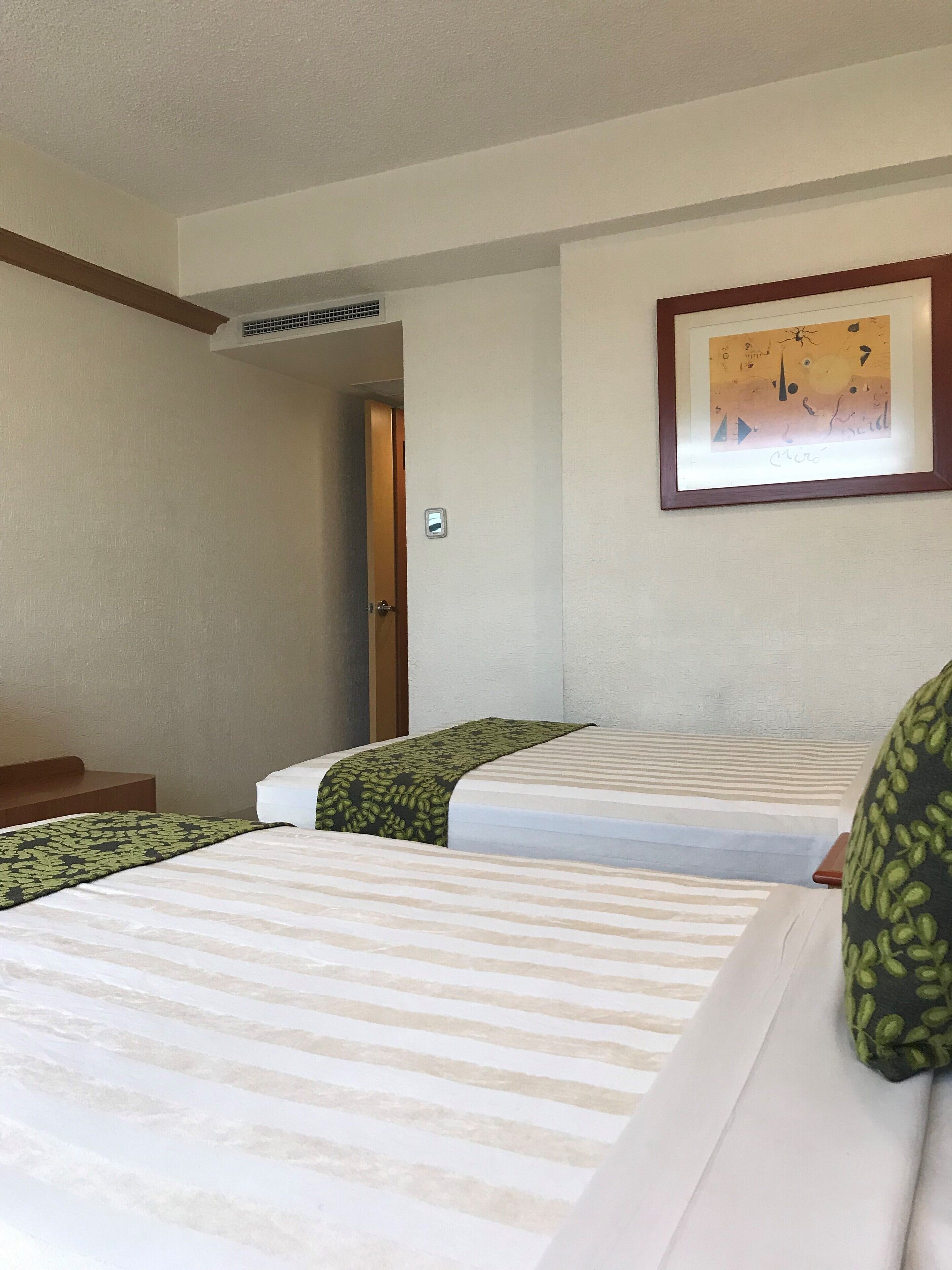 deluxe quadruple room, 2 double beds, non smoking | free wifi, bed sheets