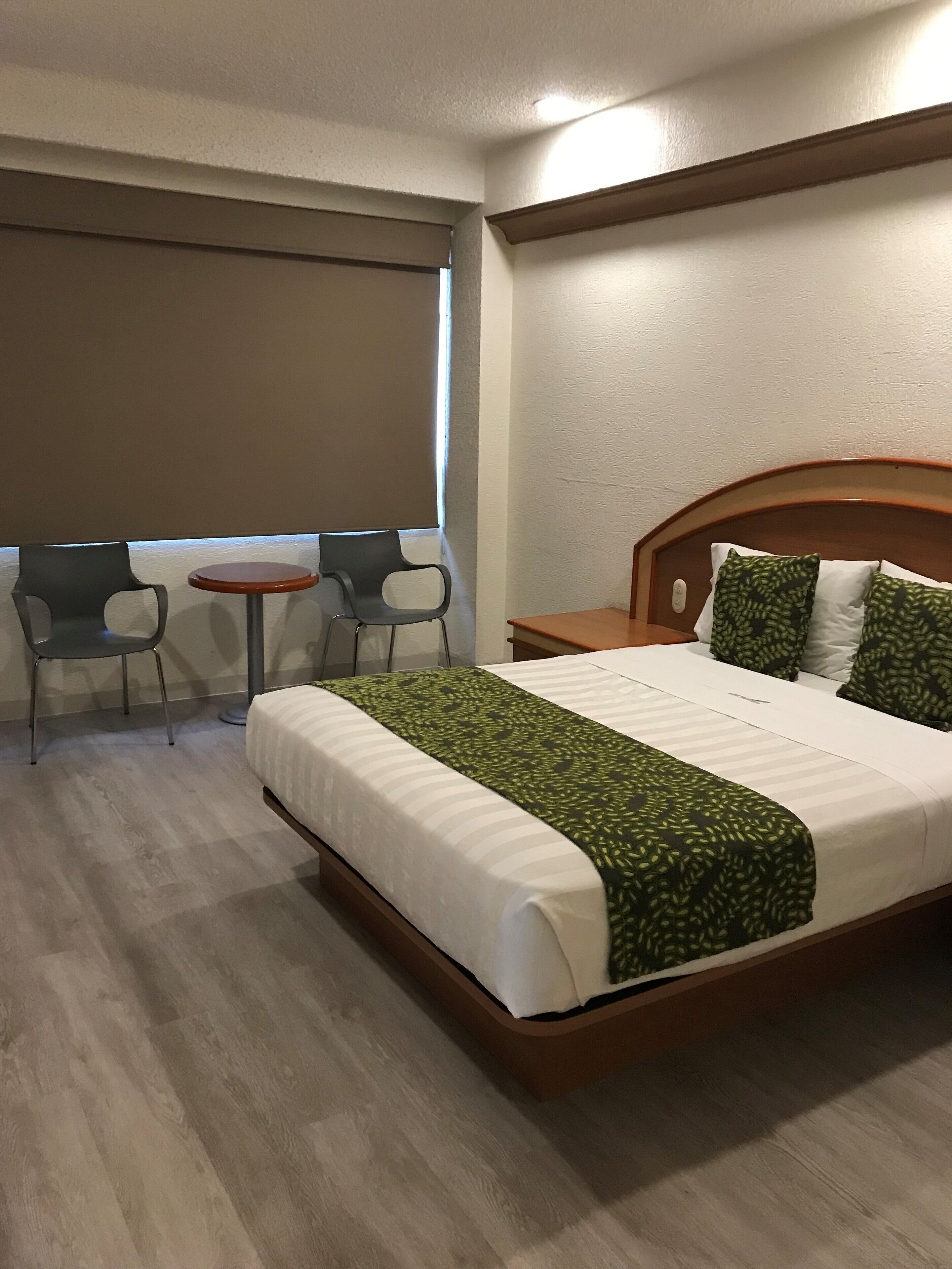 deluxe double room, 1 queen bed, non smoking | free wifi, bed sheets