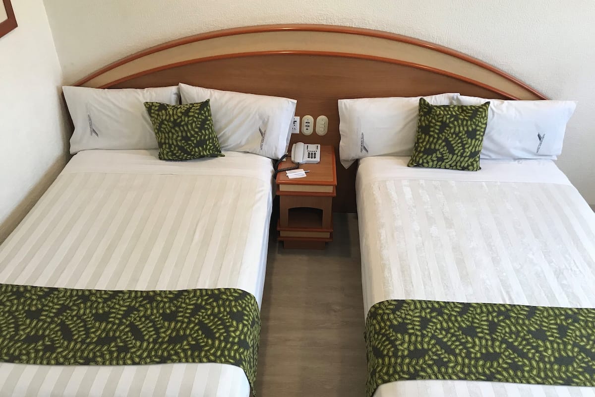 deluxe quadruple room, 2 double beds, non smoking | free wifi, bed sheets