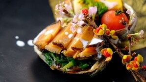 A gourmet dish with various ingredients and garnishes. - Yuraku (Misasa)