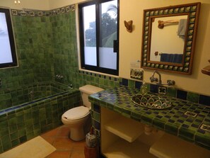 Shower, towels, soap, toilet paper