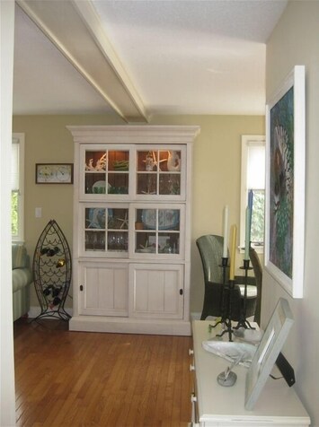 Living Room Area with beautiful Cape Style Furniture and China Cabinet