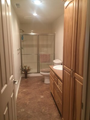 Bathtub, jetted bath, hair dryer, towels