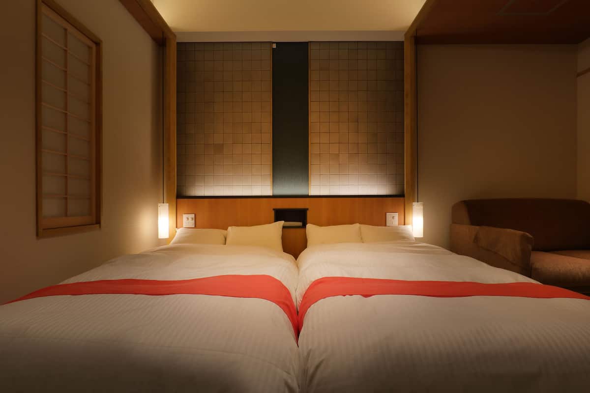 twin room with open-air bath | 1 bedroom, minibar, in-room safe, soundproofing