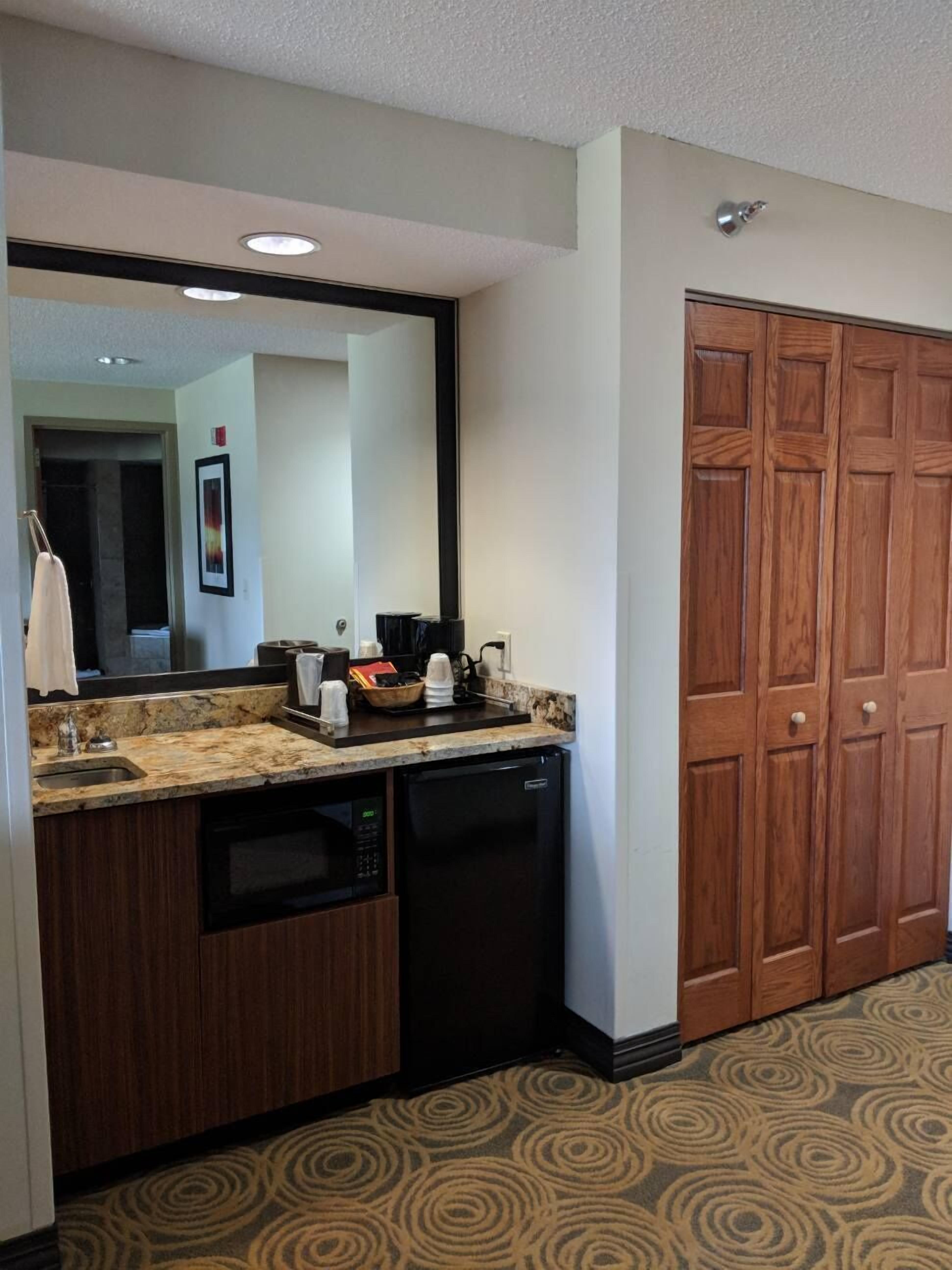 double queen suite | living area | 43-inch flat-screen tv with cable channels, tv