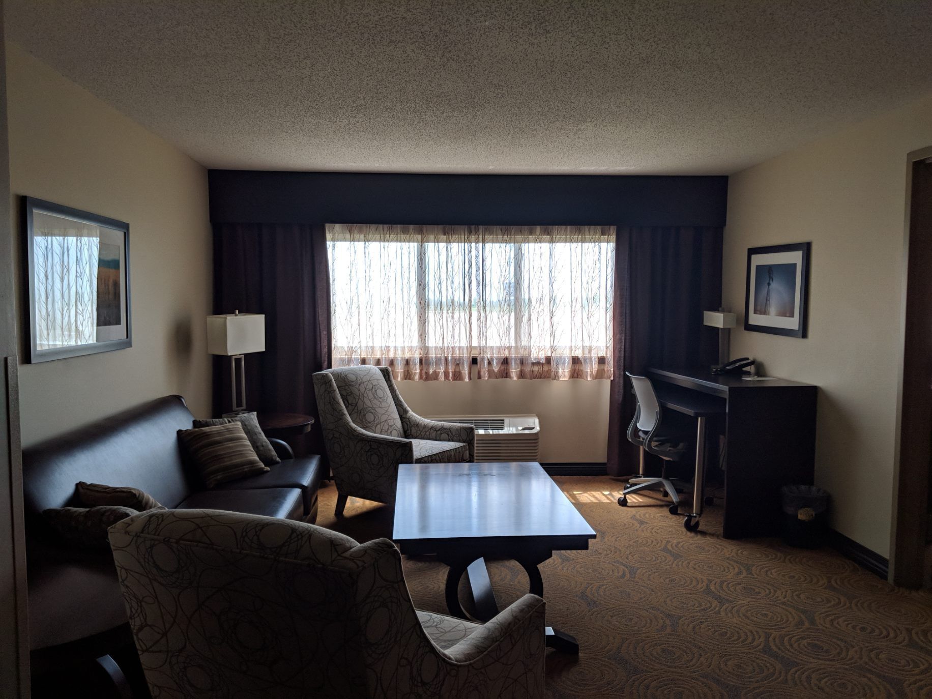 king suite | living area | 43-inch flat-screen tv with cable channels, tv