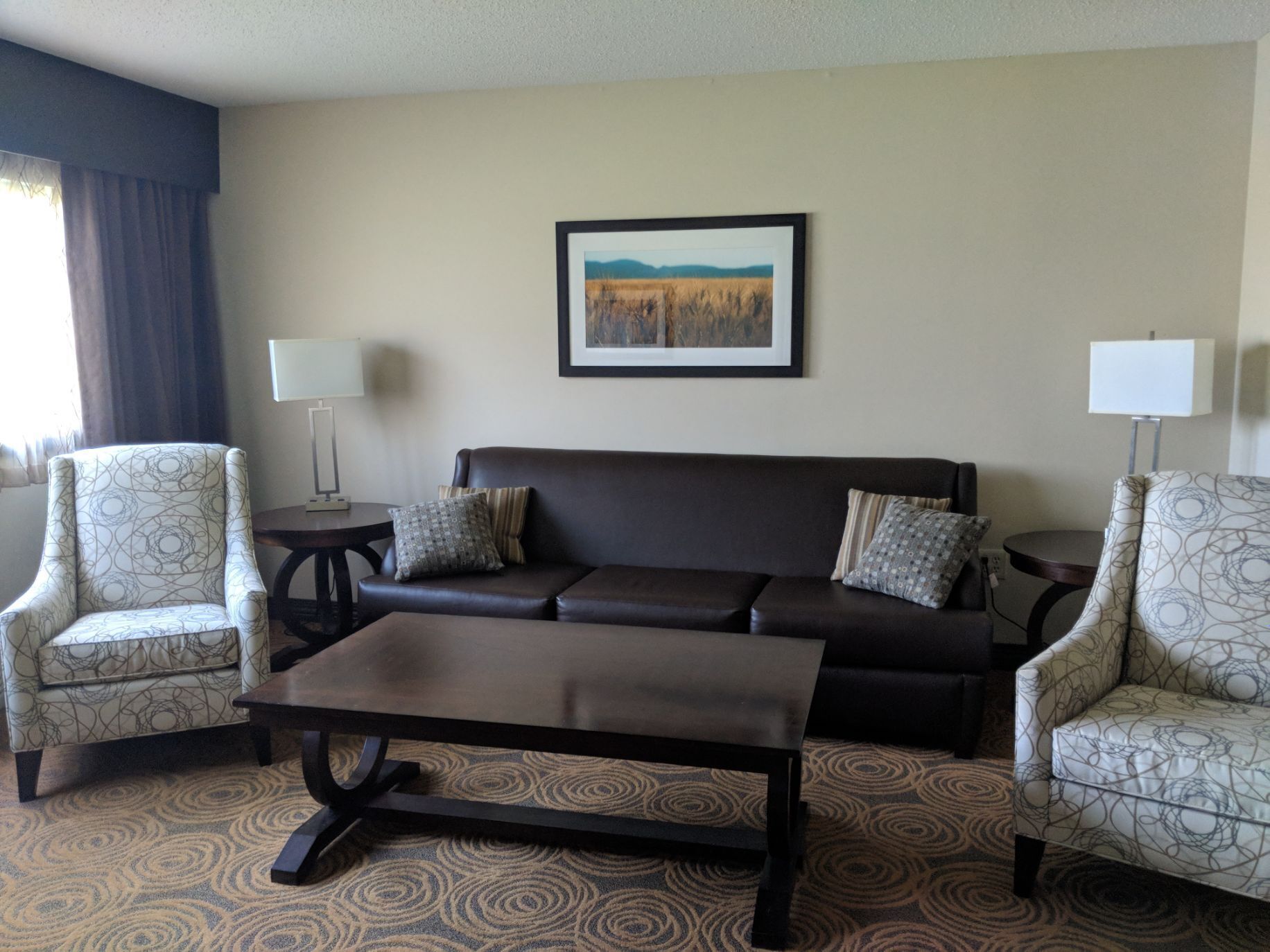 king suite | living area | 43-inch flat-screen tv with cable channels, tv