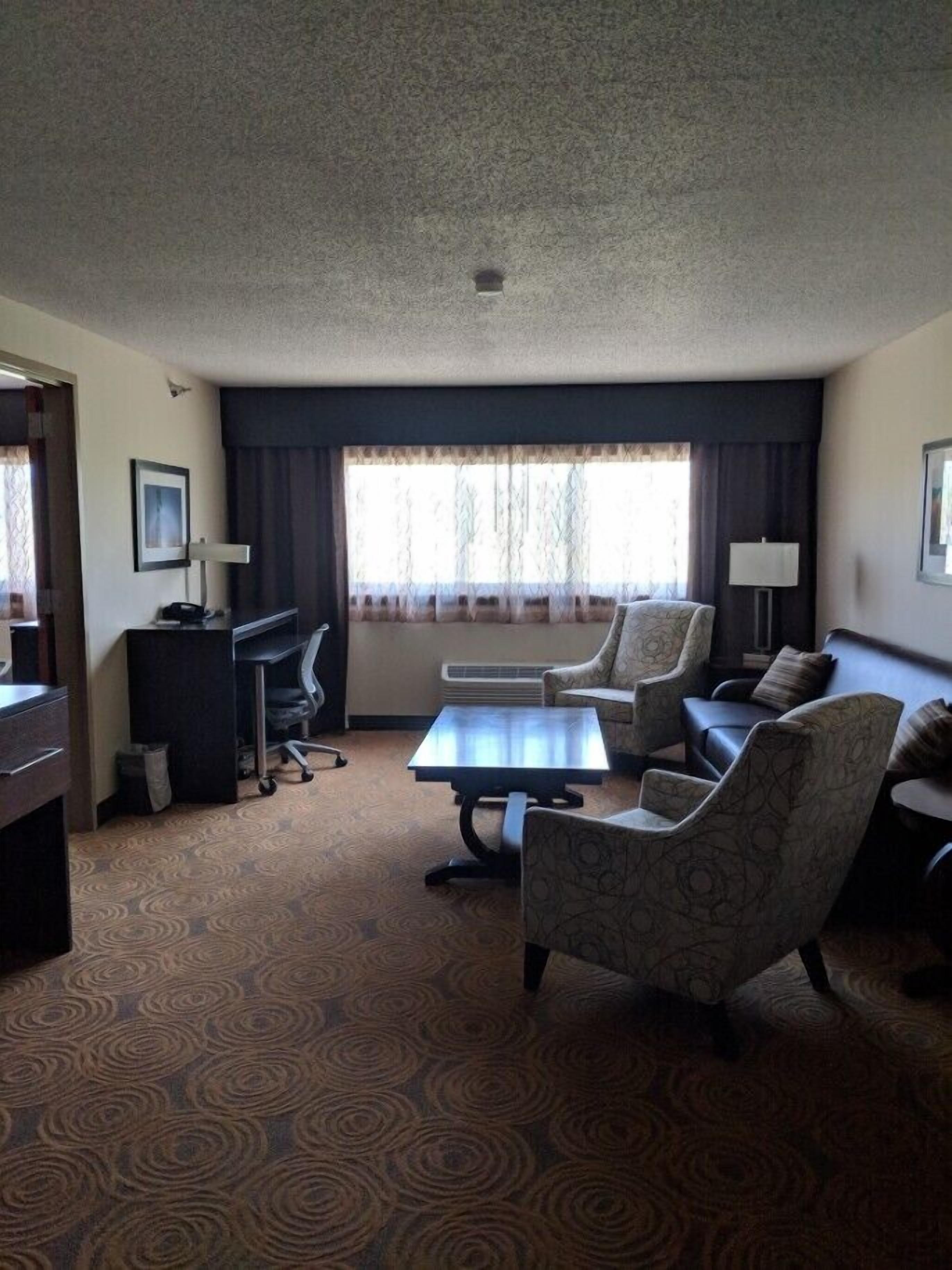 double queen suite | living area | 43-inch flat-screen tv with cable channels, tv