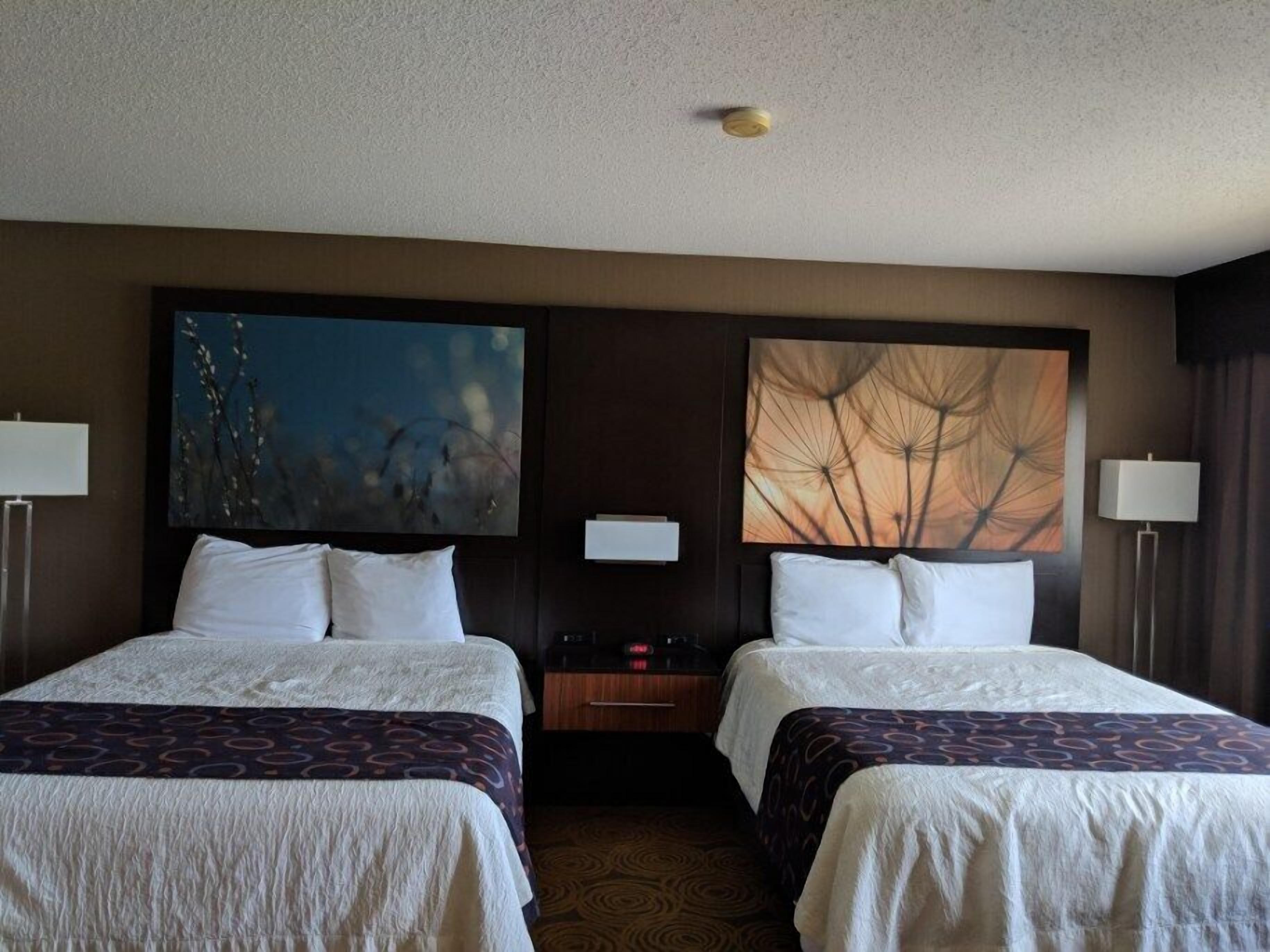 double queen suite | in-room safe, desk, laptop workspace, iron/ironing board