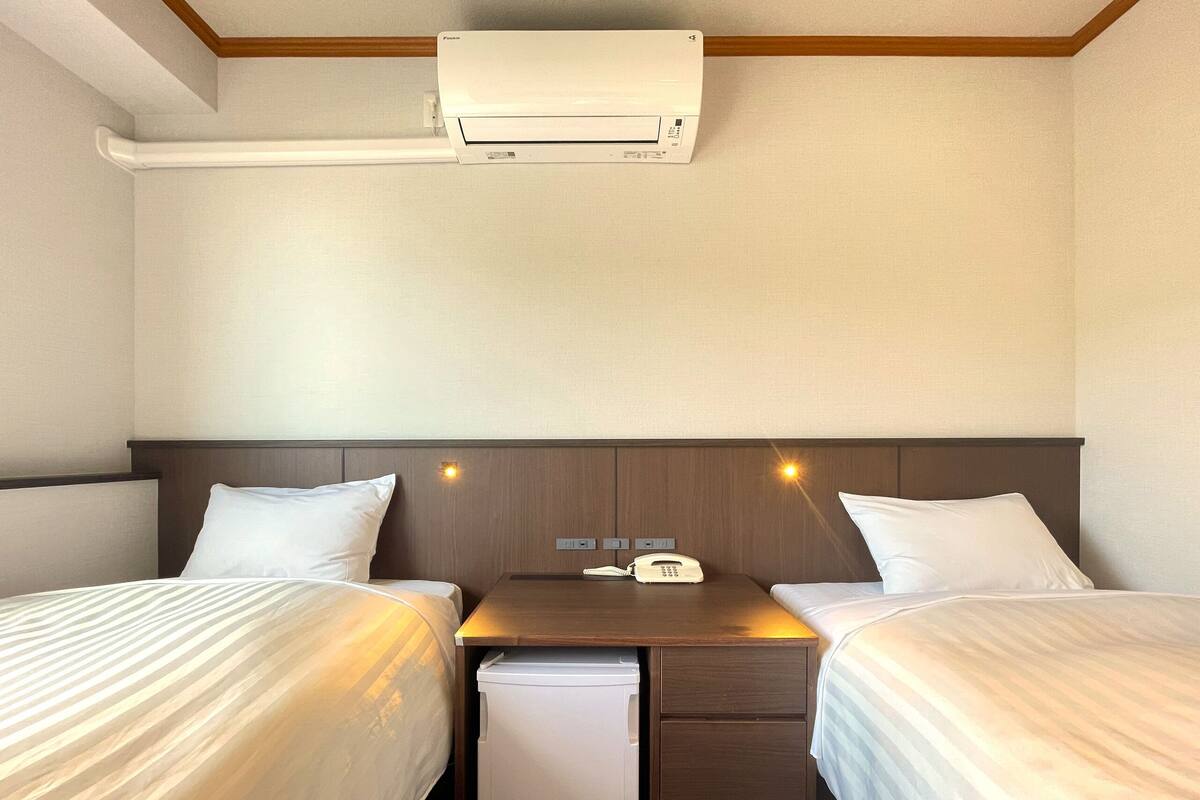 Eenvoudige Twin kamer, niet-roken (Large) | Een bureau, gratis wifi, beddengoed