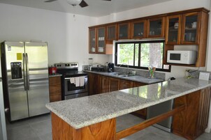 Family House, Multiple Beds, Garden View | Private kitchen | Fridge, microwave, stovetop, cookware/dishes/utensils