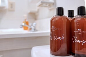 Bathtub, hair dryer, towels