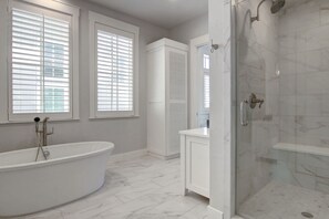 Bathtub, hair dryer, towels