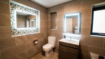 Bathtub, hair dryer, towels, soap