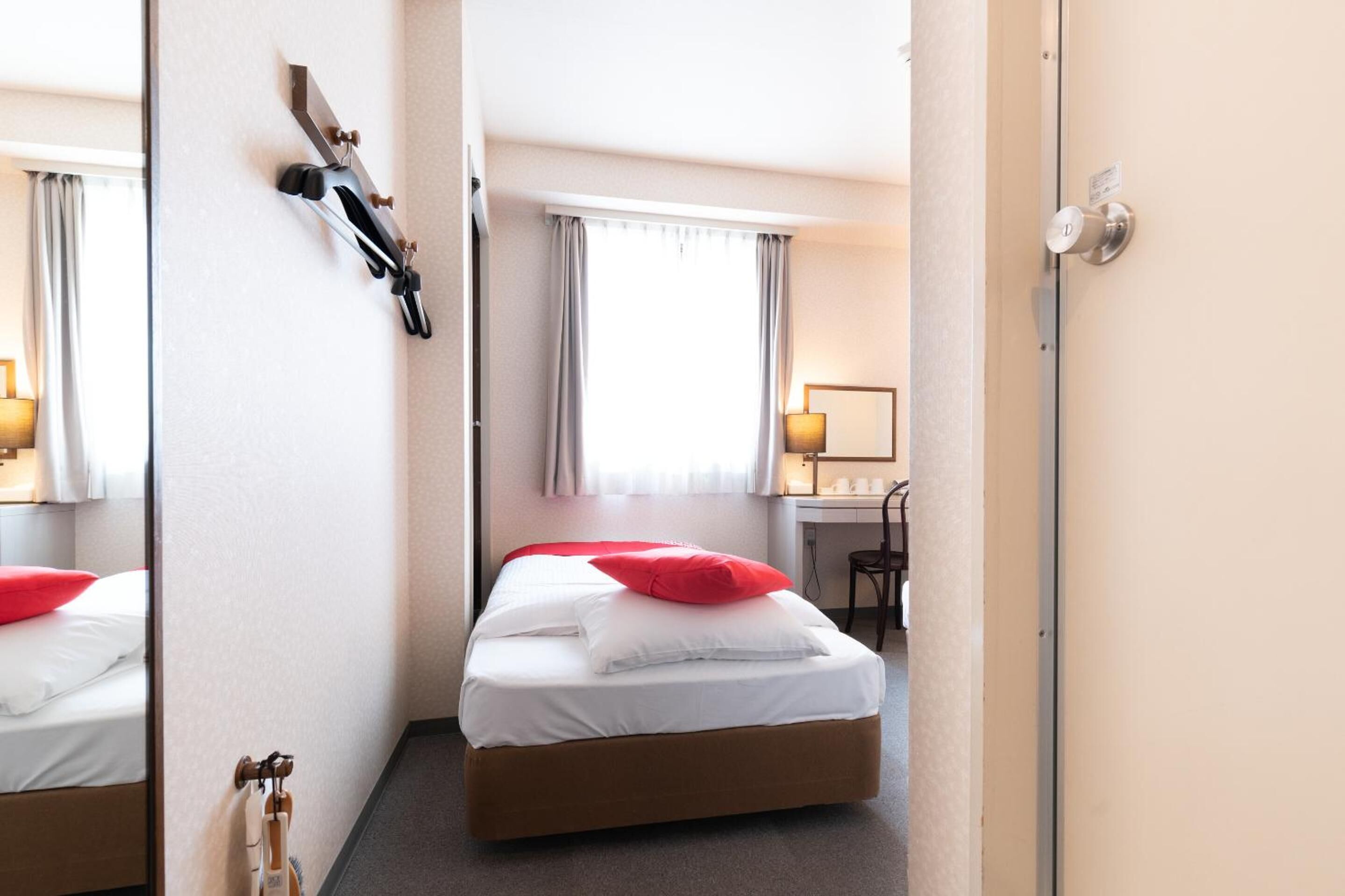 premium bedding, desk, blackout curtains, free wifi