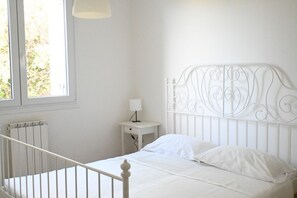 2 dormitoris i roba de llit 