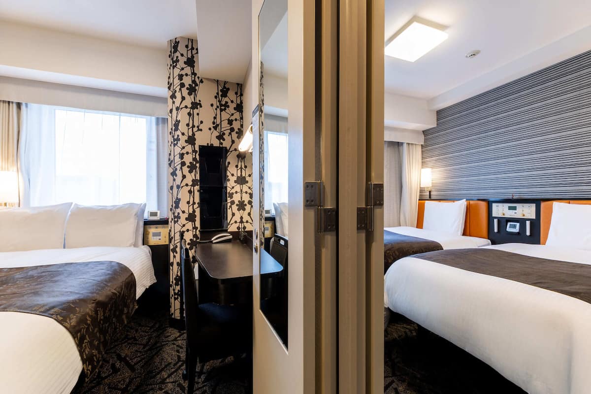 Down comforters, desk, laptop workspace, blackout drapes