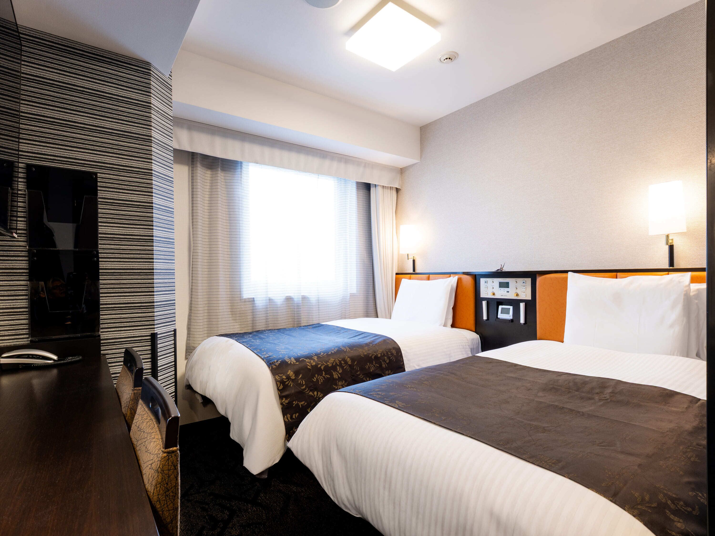 Down comforters, desk, laptop workspace, blackout drapes