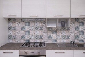 Een koelkast, een oven, een vriezer