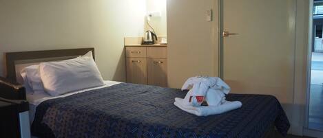 King Single Room | Desk, laptop workspace, blackout curtains, free WiFi