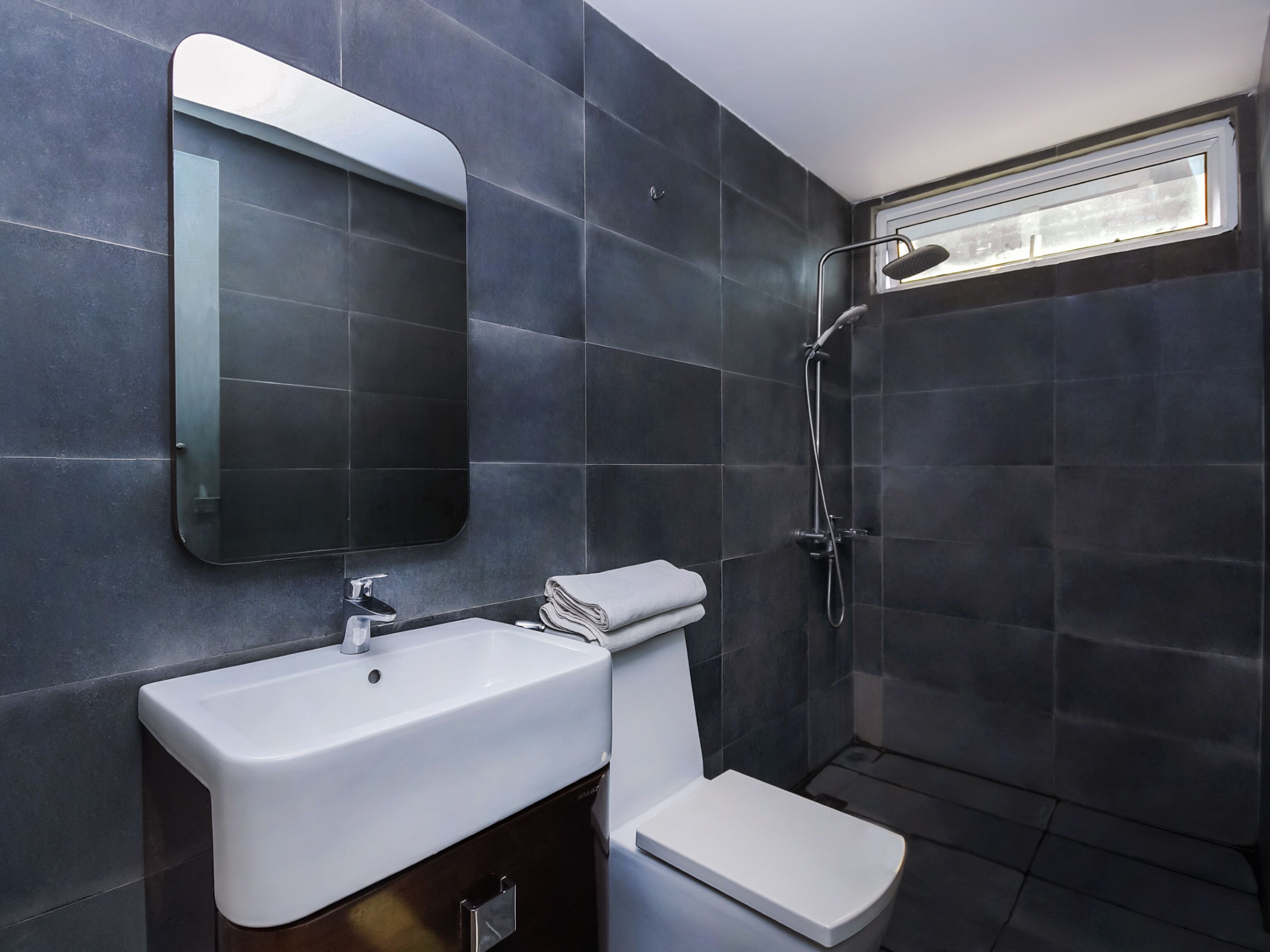deluxe double room, 1 king bed | bathroom | shower, free toiletries, bidet, towels