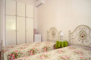 2 habitaciones, tabla de planchar con plancha, wifi y ropa de cama 